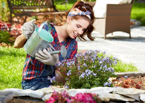 Gardening staff wearing PPE while carrying out a garden task