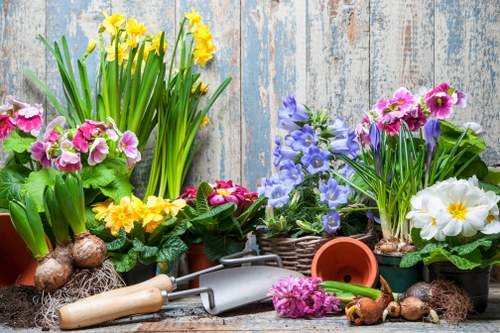 Gardeners lifting materials safely as part of routine work